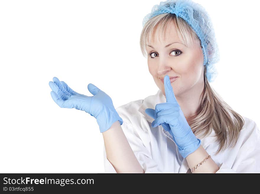 Young pretty doctor portrait saying shh on isolated background. Young pretty doctor portrait saying shh on isolated background