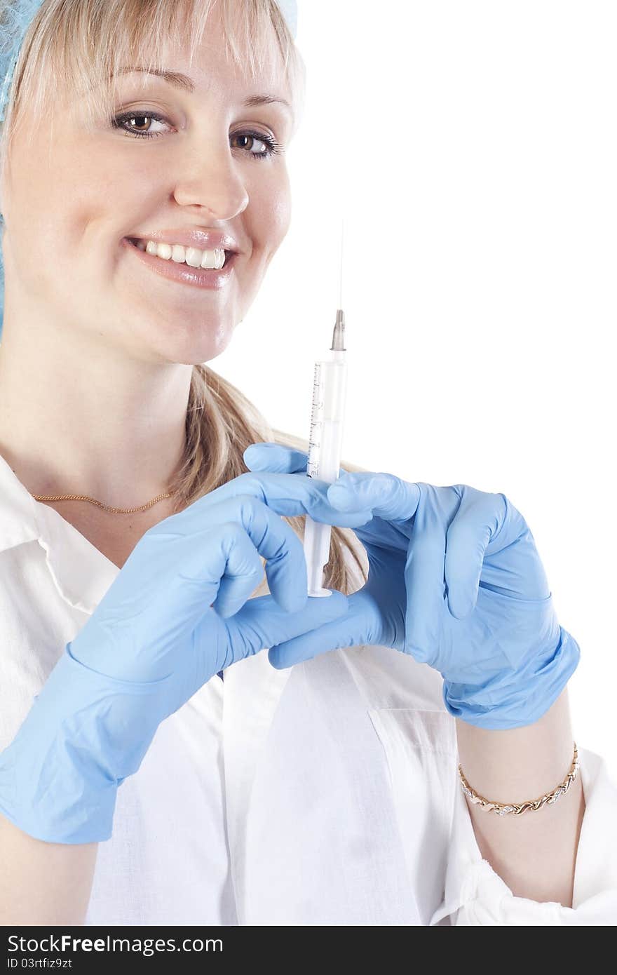 Pretty doctor holding a syringe