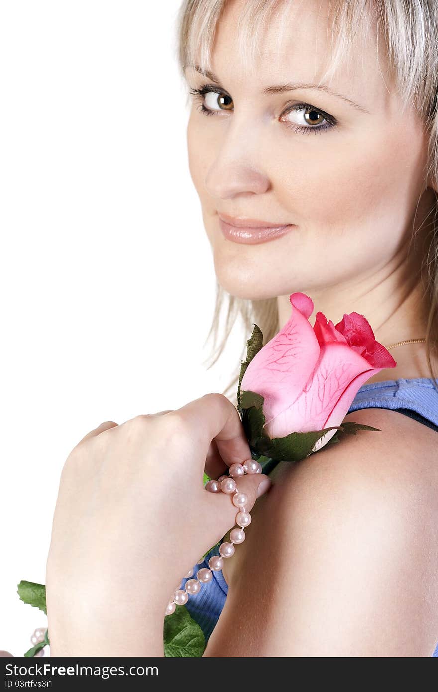 Portrait of young woman holding rose