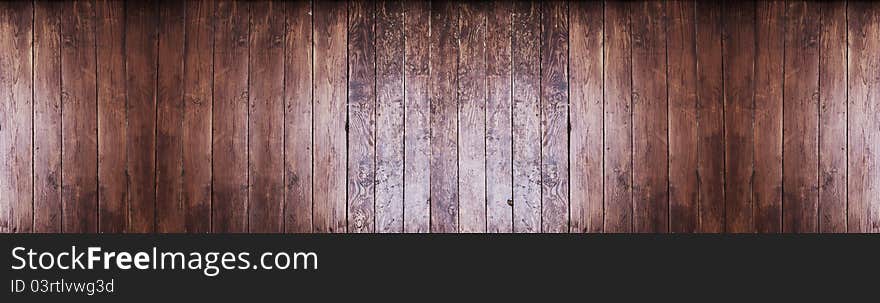 A blank wooden wall with space for text. A blank wooden wall with space for text