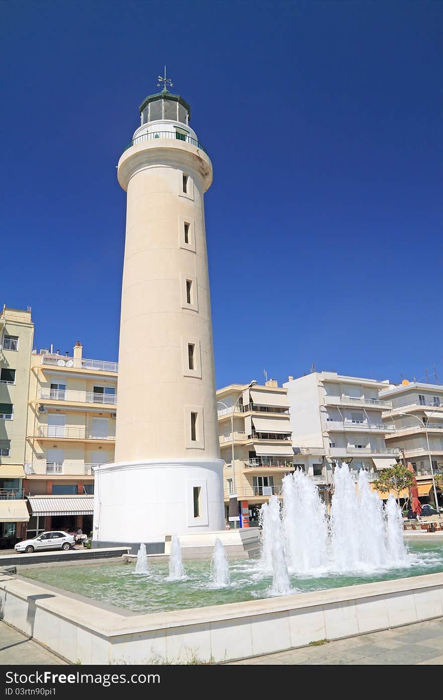 Lighthouse under bright blue sky