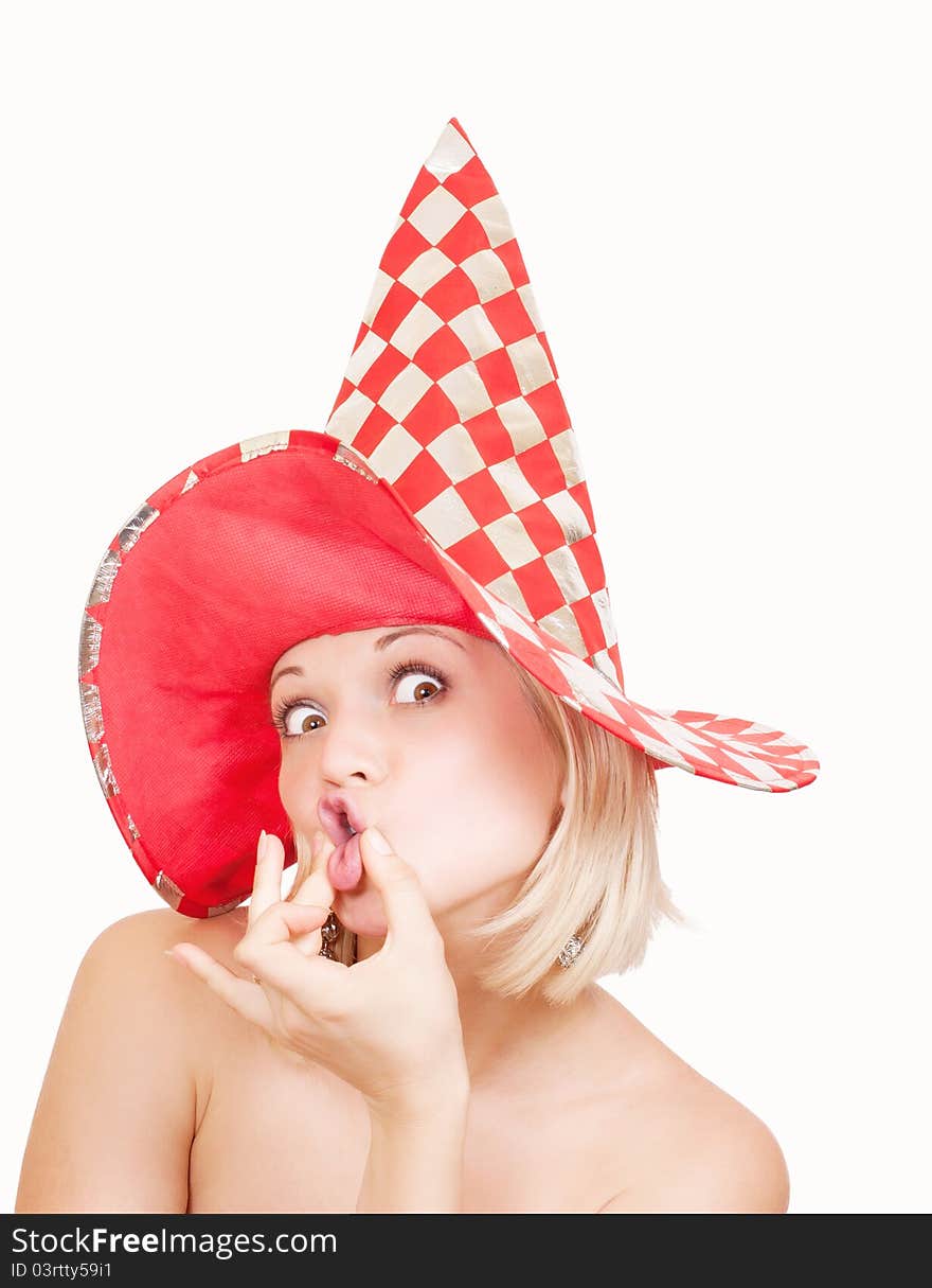 Woman in red hat making a funny face known as afish-face on white background. Woman in red hat making a funny face known as afish-face on white background