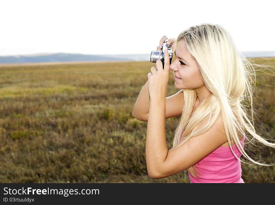 Close up of a girl clicking camera