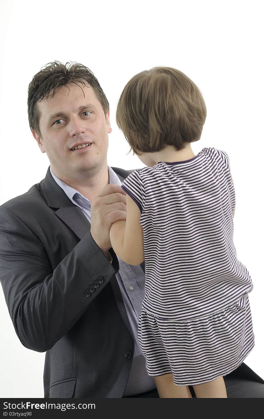 Man playing with his daughter