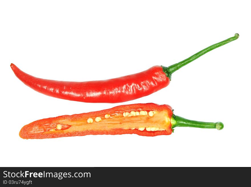 Sectional View Of A Cut Fresh Chili. Image Is Isolated On White Background. Sectional View Of A Cut Fresh Chili. Image Is Isolated On White Background