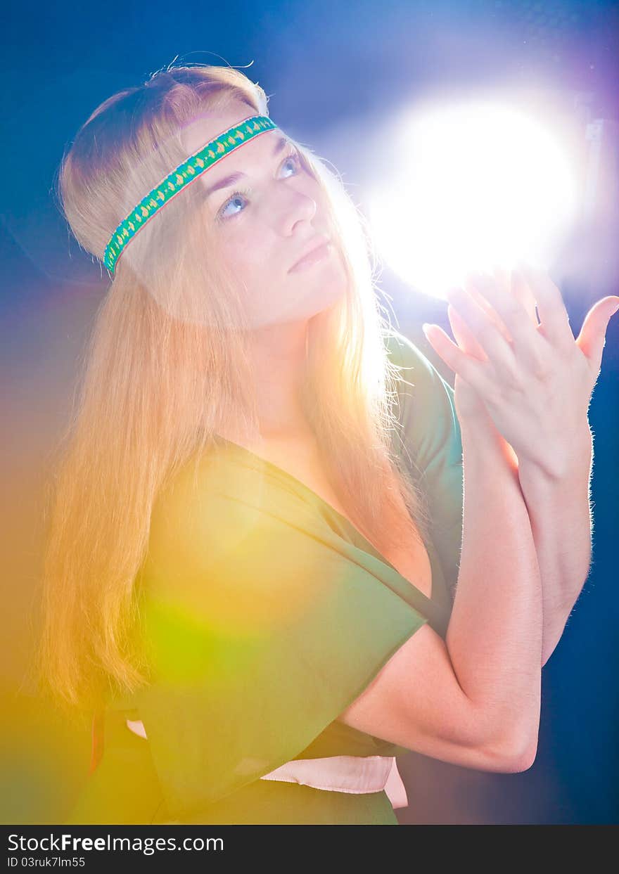 Beautiful fabulous girl in a green dress