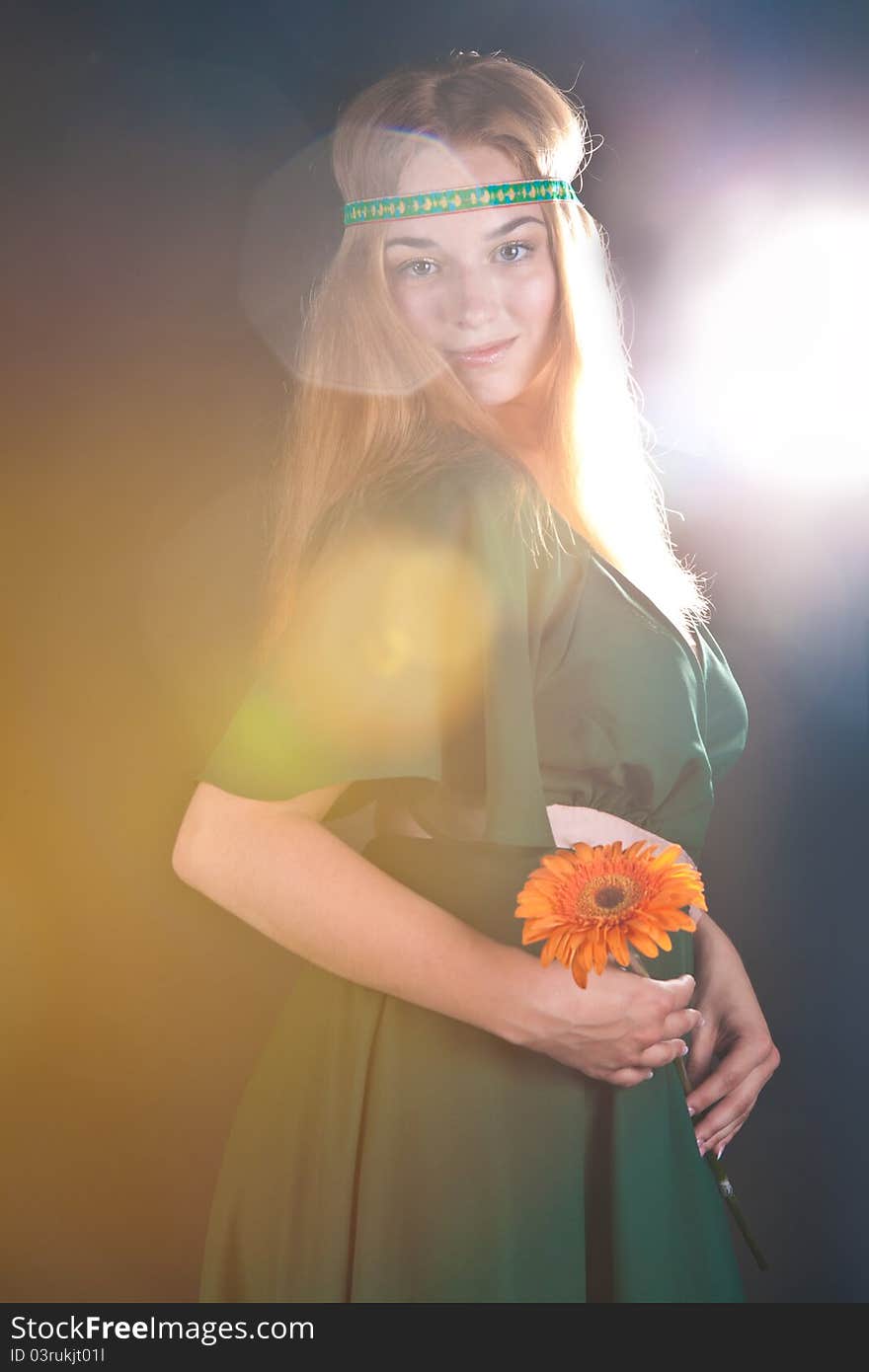 Beautiful fabulous girl in a green dress