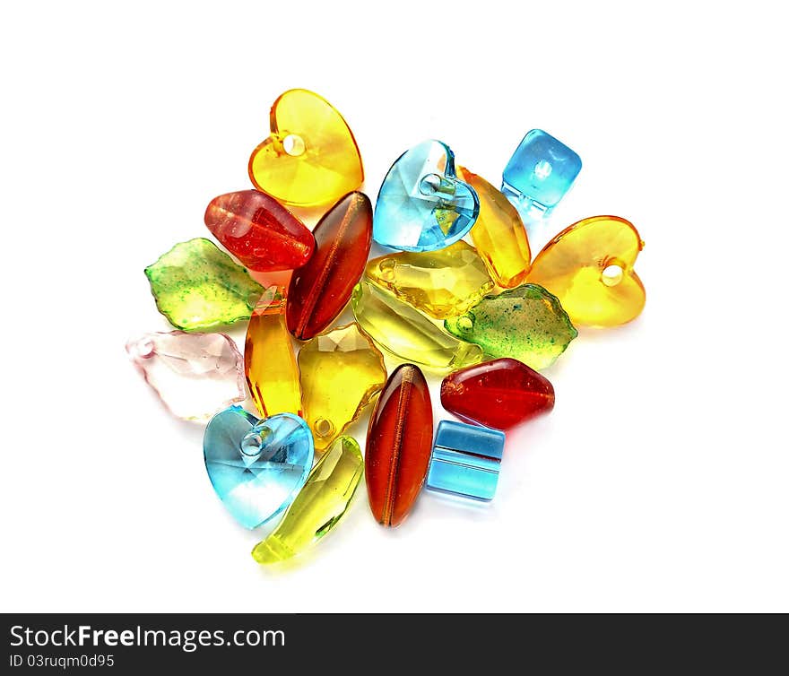 Colorful beads on white background