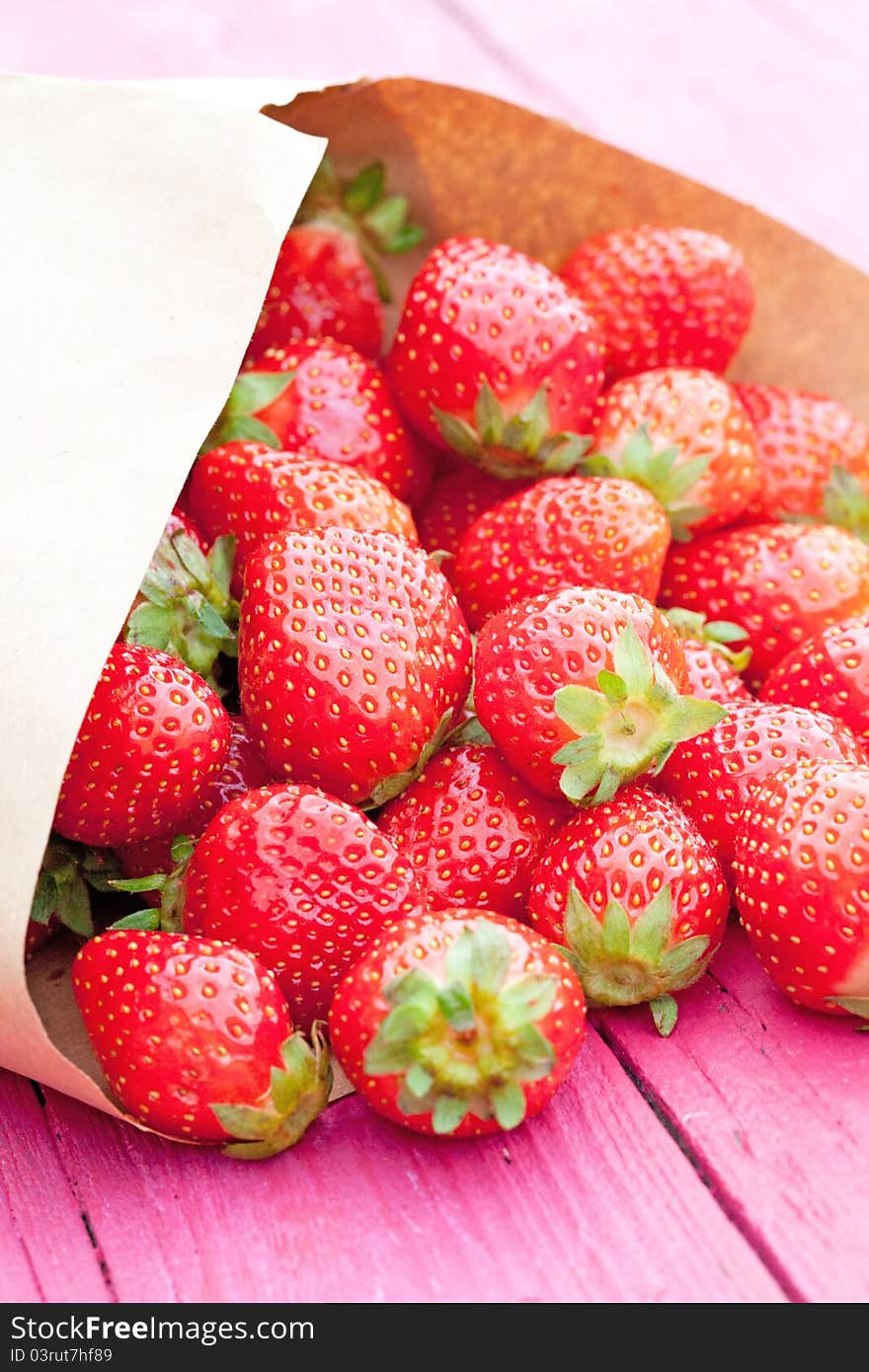 Strawberry in a paper bag