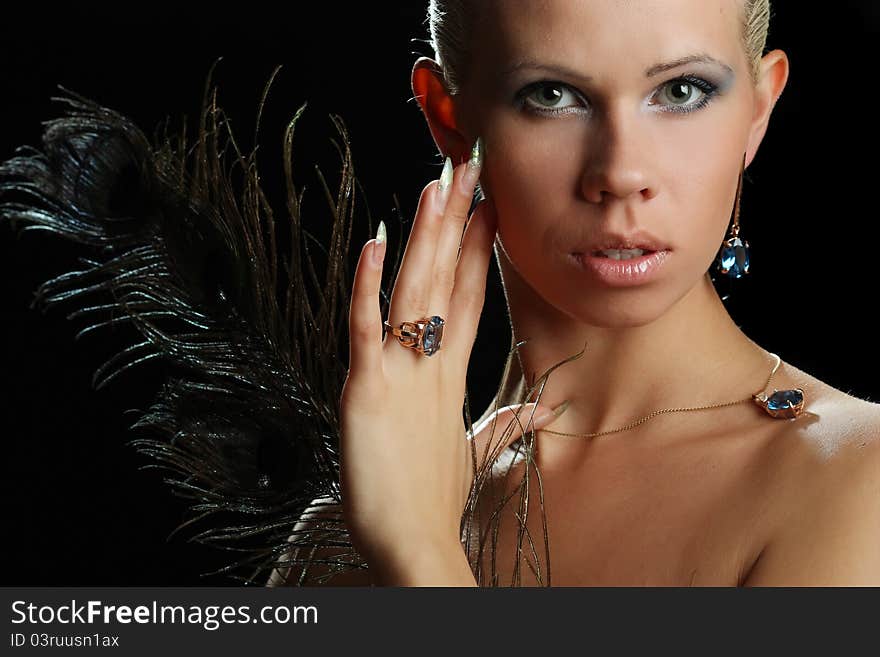 Beautiful girl with blue eyes and decorations