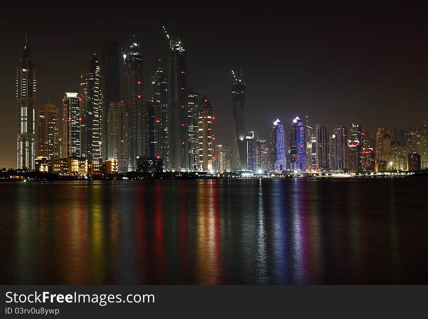 Dubai marina view at night from palm jumeirah. Dubai marina view at night from palm jumeirah