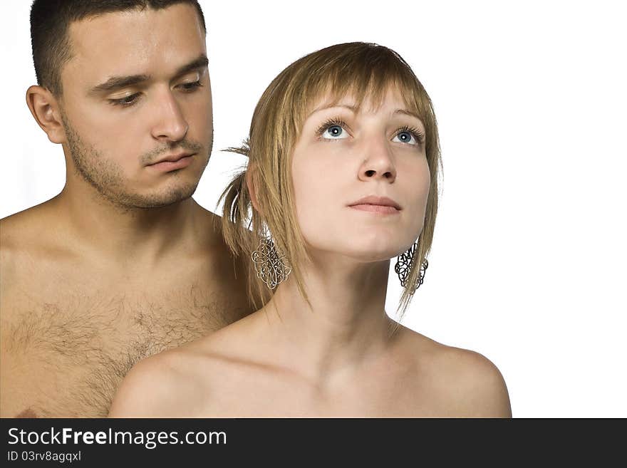 Brunette women with blue eyes looking up, men in background looking at her. Brunette women with blue eyes looking up, men in background looking at her