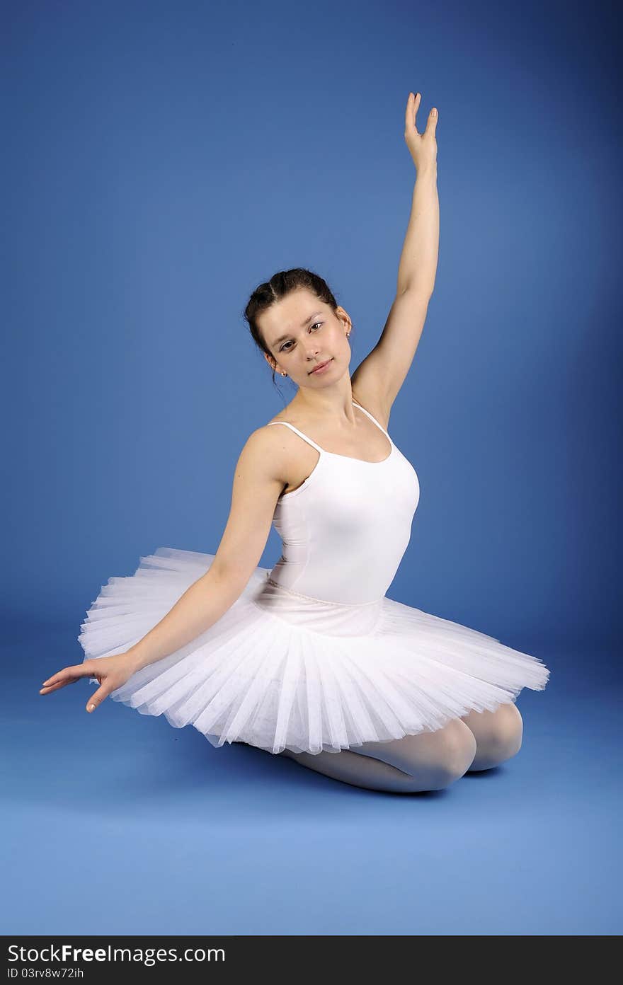 Ballet dancer posing in white tutu. Ballet dancer posing in white tutu