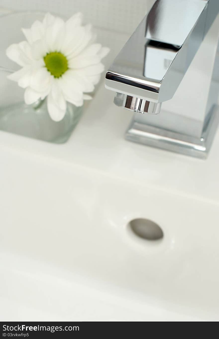 Closeup of modern bathroom tap. Closeup of modern bathroom tap