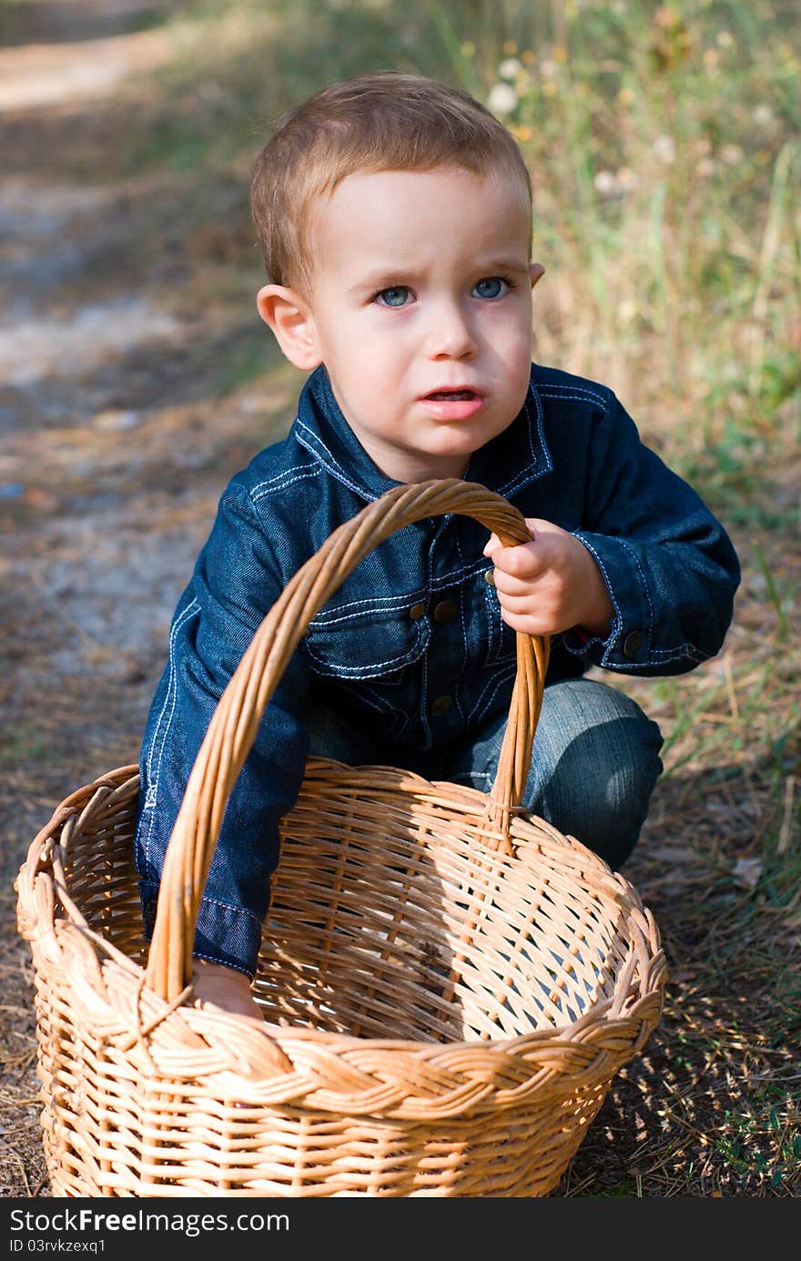 Cute boy and basket