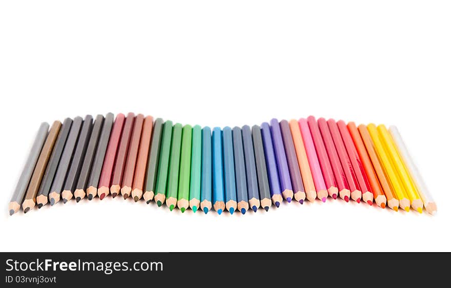 Set of color pencils on white background