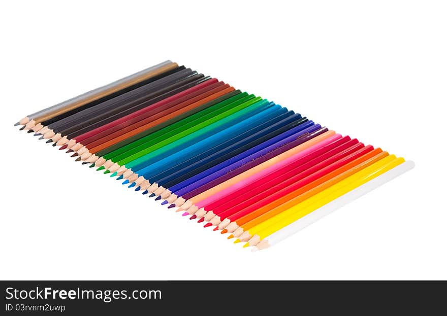 Set of color pencils on white background