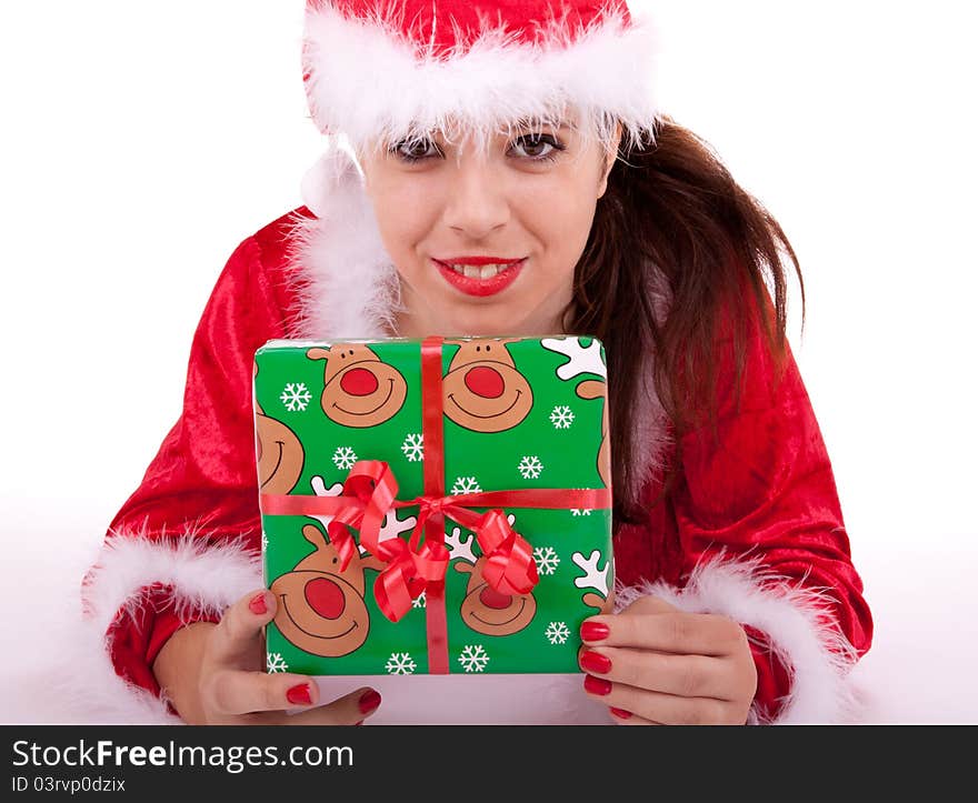 Santa Claus has a gift box in her hands. Santa Claus has a gift box in her hands