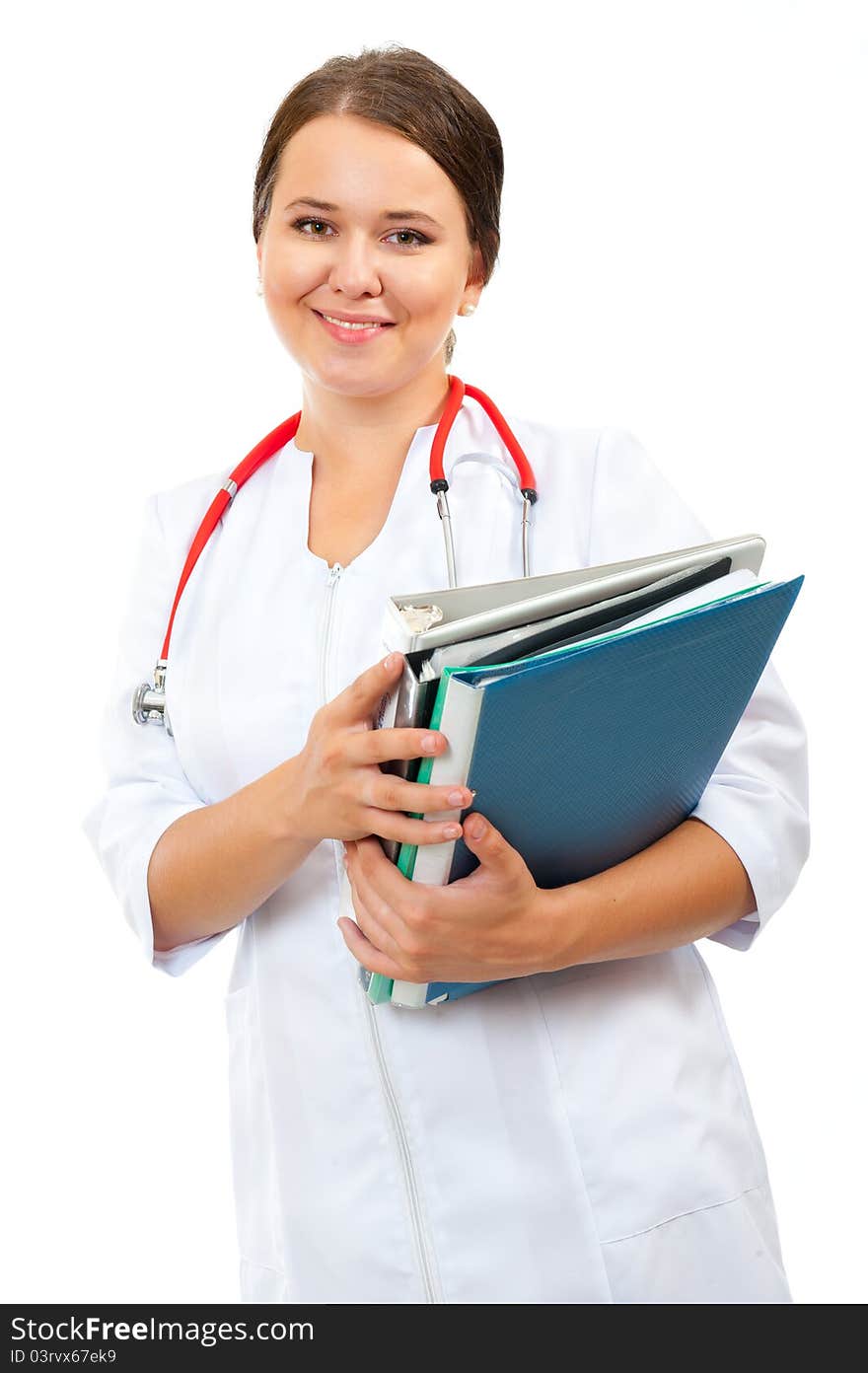 Young medical smiling woman doctor holding files portrait isolated on white background. Young medical smiling woman doctor holding files portrait isolated on white background