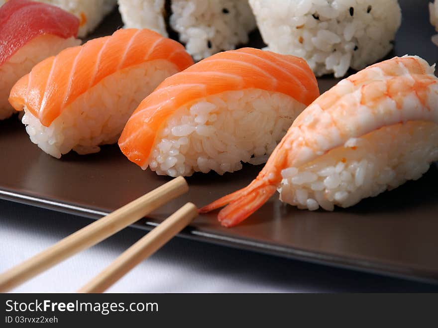 Sushi on a brown dish