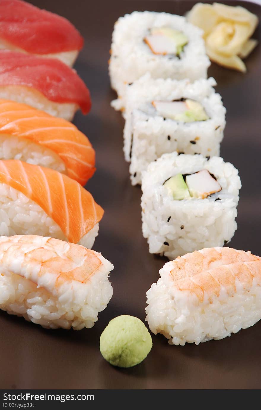 Sushi on a brown dish