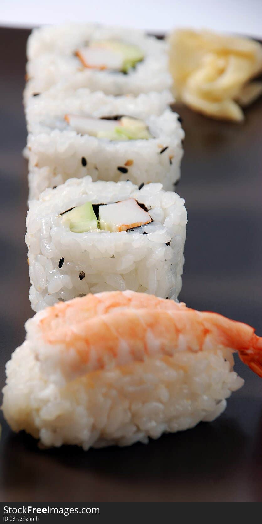 Sushi on a brown dish