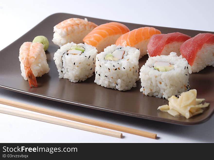 Sushi on a brown dish