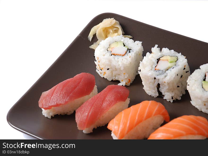 Sushi on a brown dish