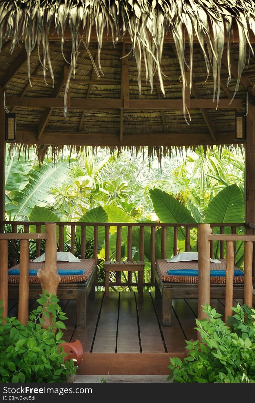 View of two nice massage tables in tropical environment