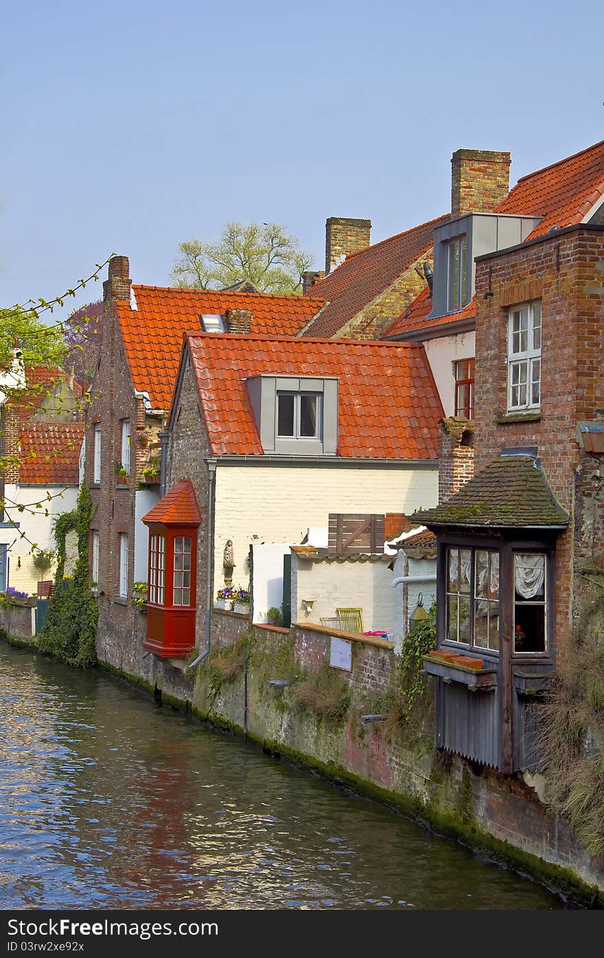 Classic view of channels of Bruges. Belgium. Medieval fairytale city. Summer urban landscape.