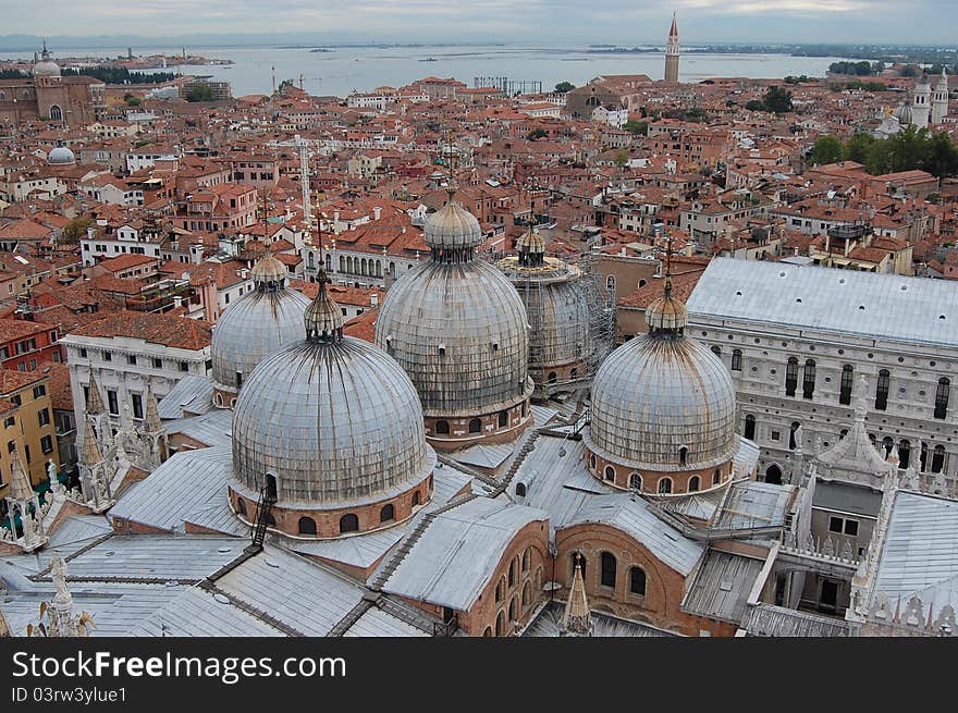 A photo across the rooftops of Venice from the Campanile in Piazza San Marco. A photo across the rooftops of Venice from the Campanile in Piazza San Marco