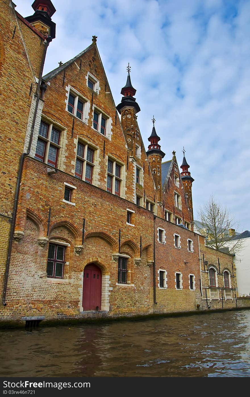 Classic view of channels of Bruges. Belgium. Medieval fairytale city. Summer urban landscape.