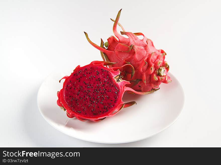 Drangon fruit - red color on a white background.