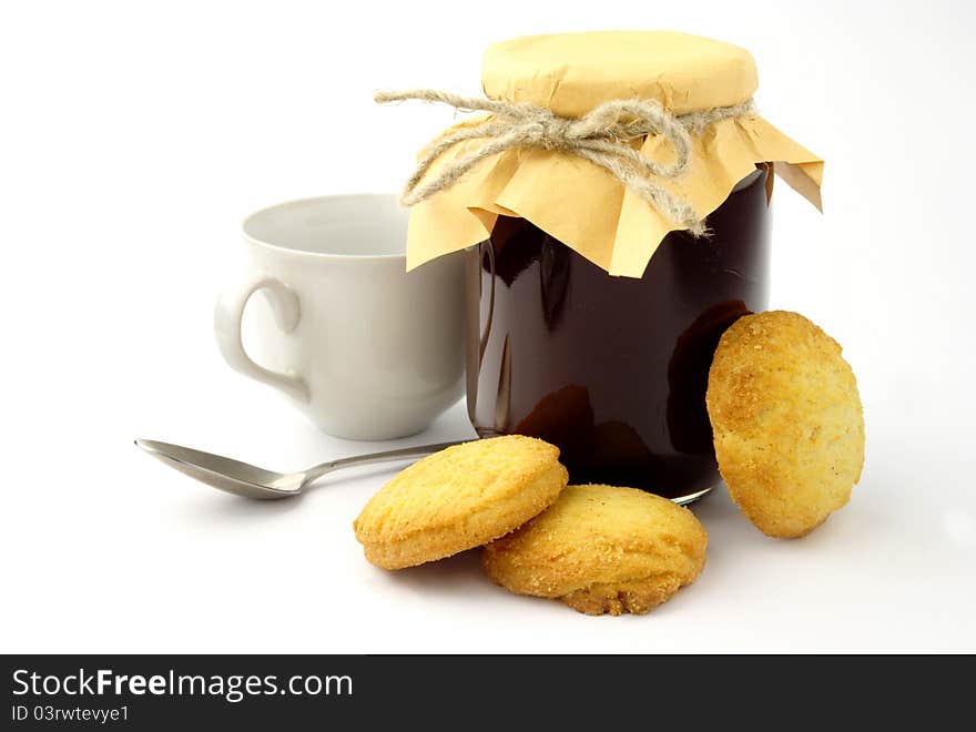 Jam in the pot on a white background. Jam in the pot on a white background