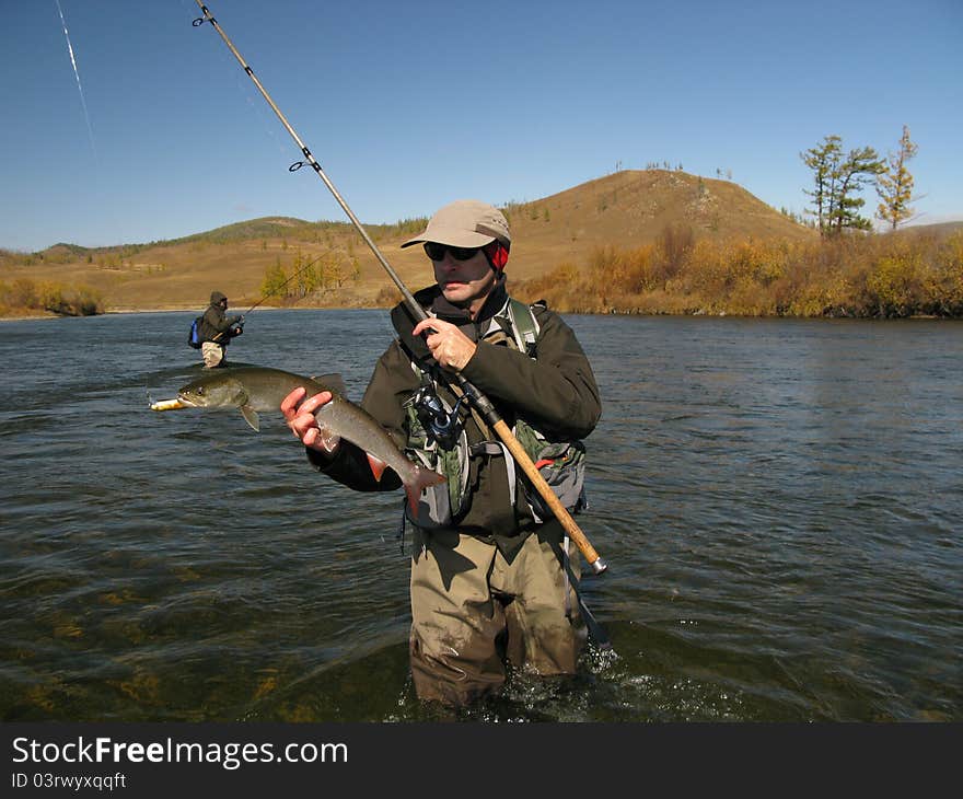 Fishing - fisherman catched big fish