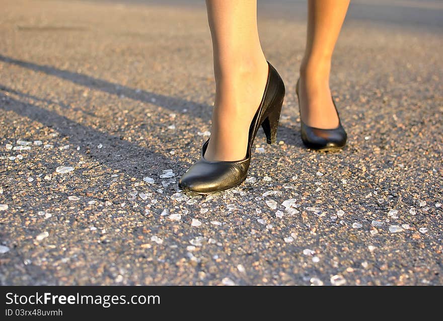 Women s foot steps on the glass