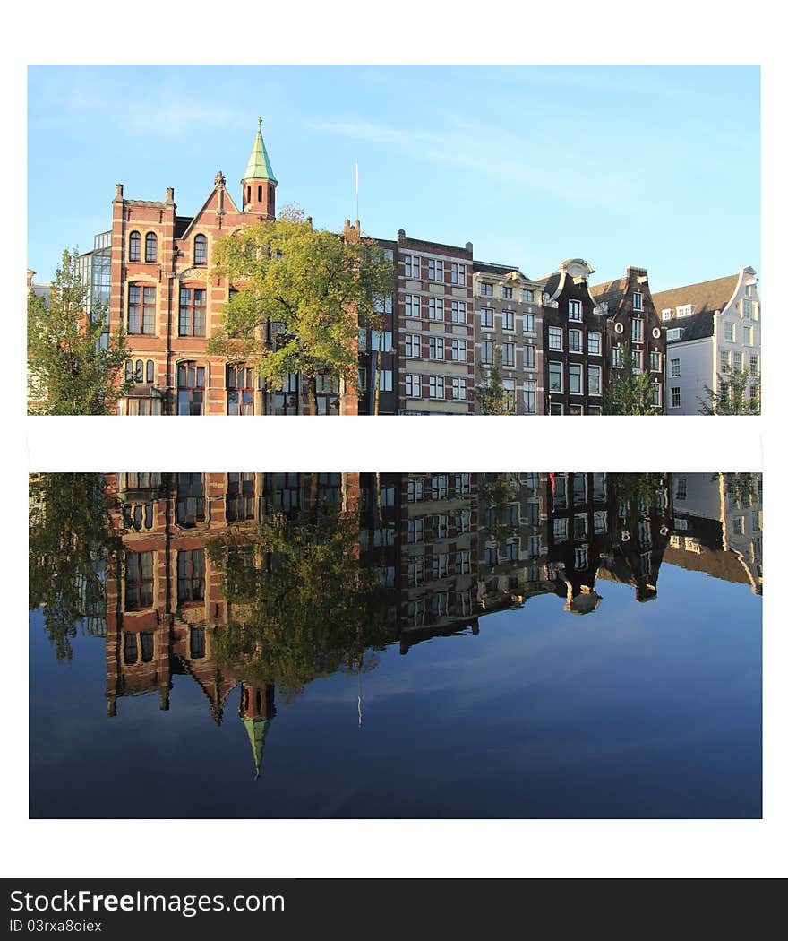 Amsterdam cityscape with calm water and reflection