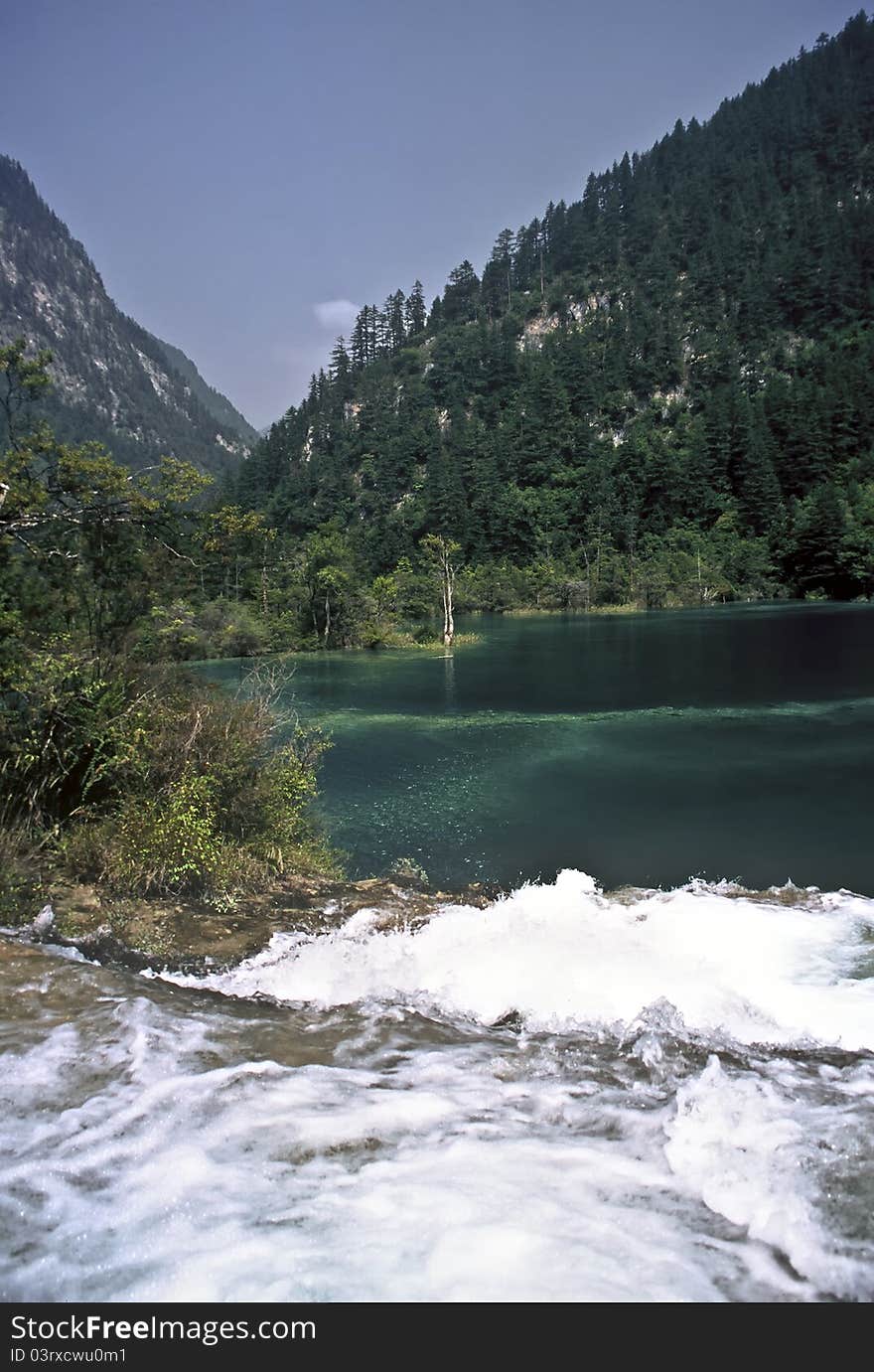 Waterfall and lake in the Jiuzhaigou National Park, China