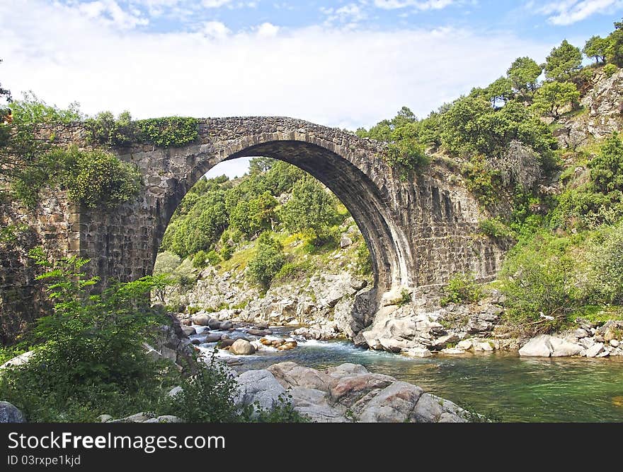 Roman bridge in the side, province of Caceres, Spain