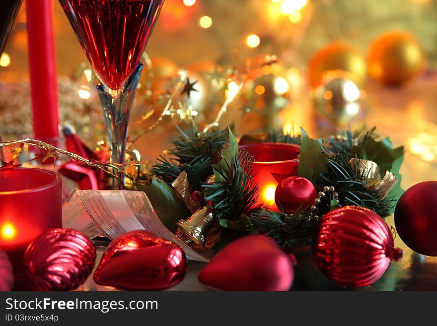 Close-up of christmas decoration and glass of red wine. Close-up of christmas decoration and glass of red wine.