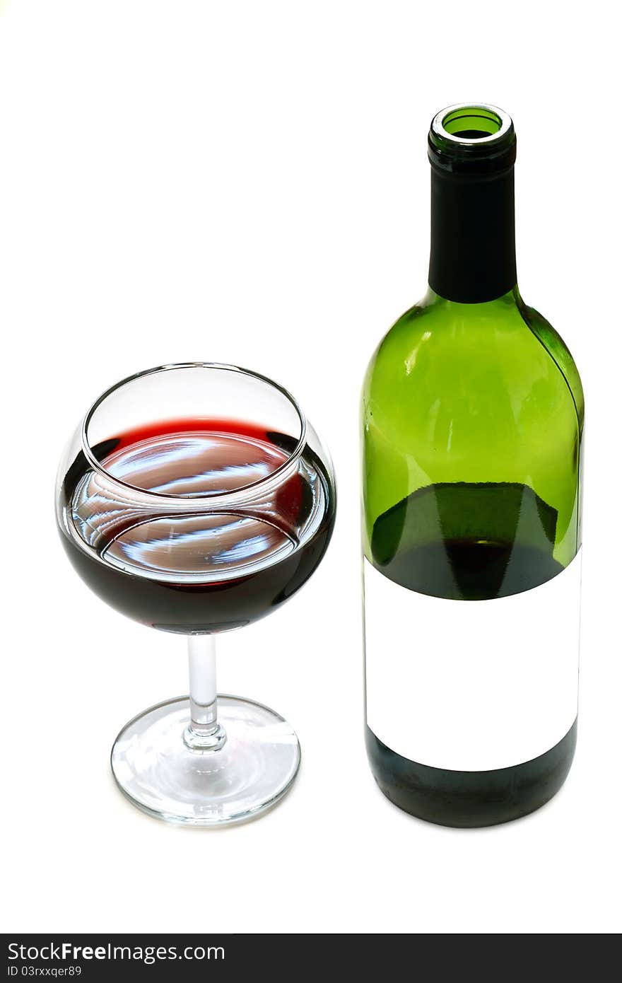 Bottle and glass of red wine