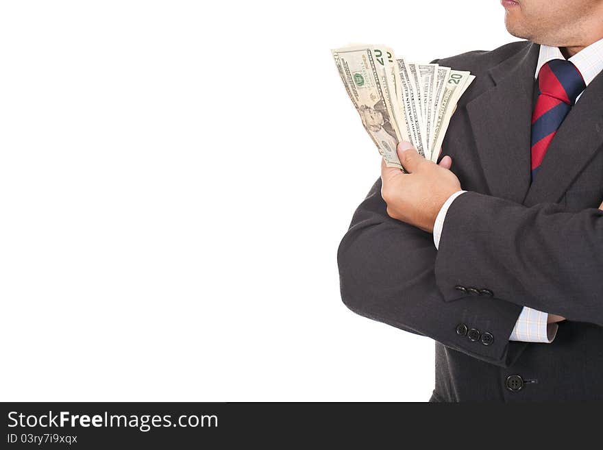 Businessman holding a lot of dollar bills