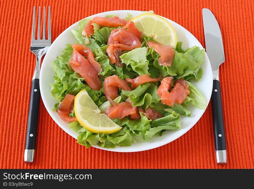 Salad with salmon and lemon