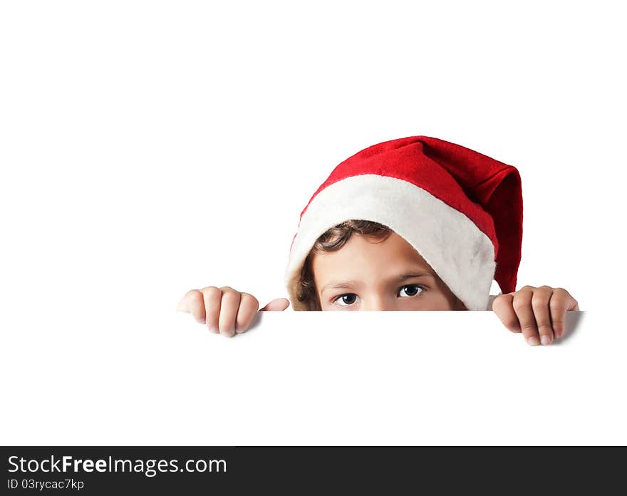 Child peeking behind a white blank sign. Child peeking behind a white blank sign