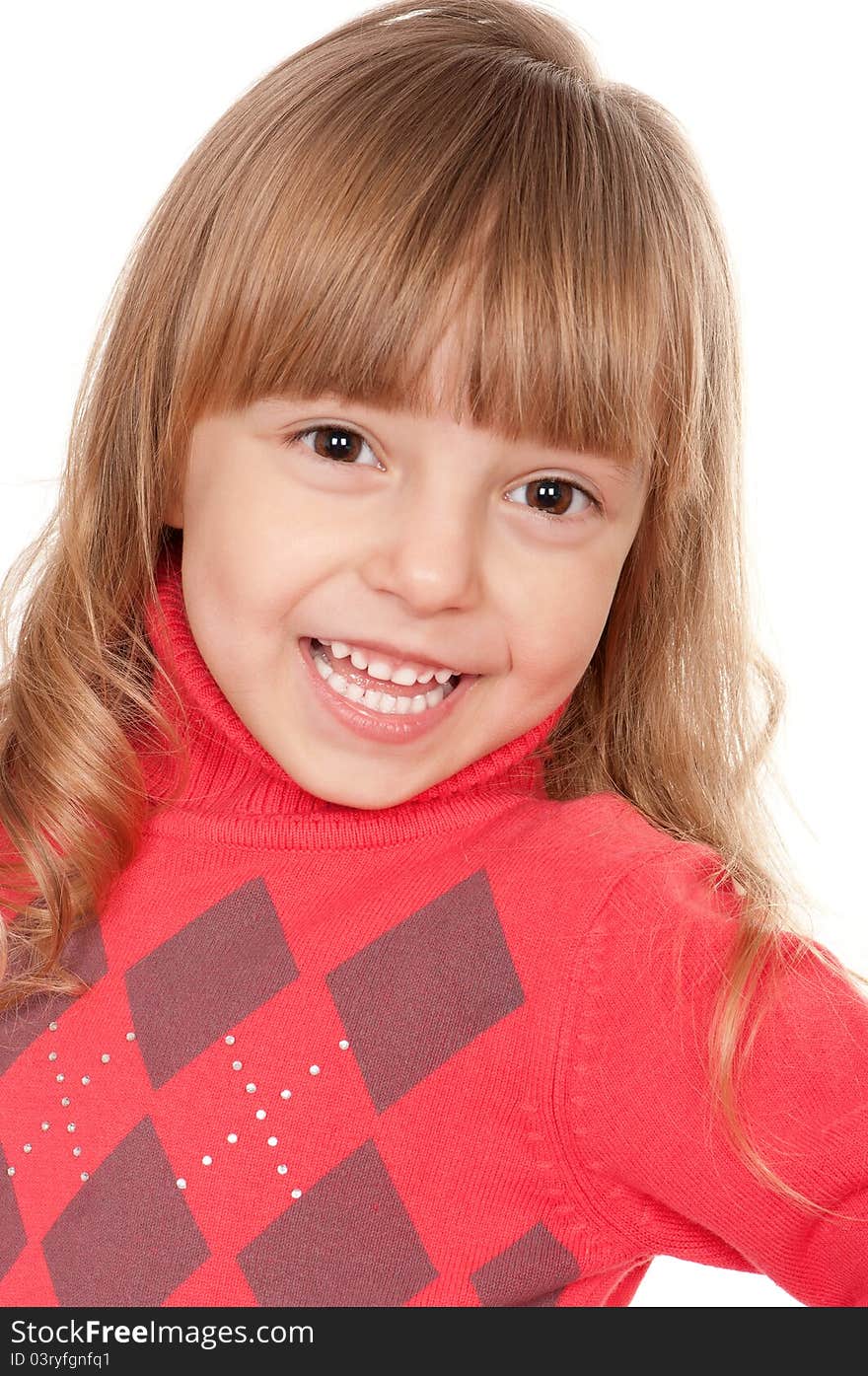 Portrait of a pretty little girl in sweater on white background