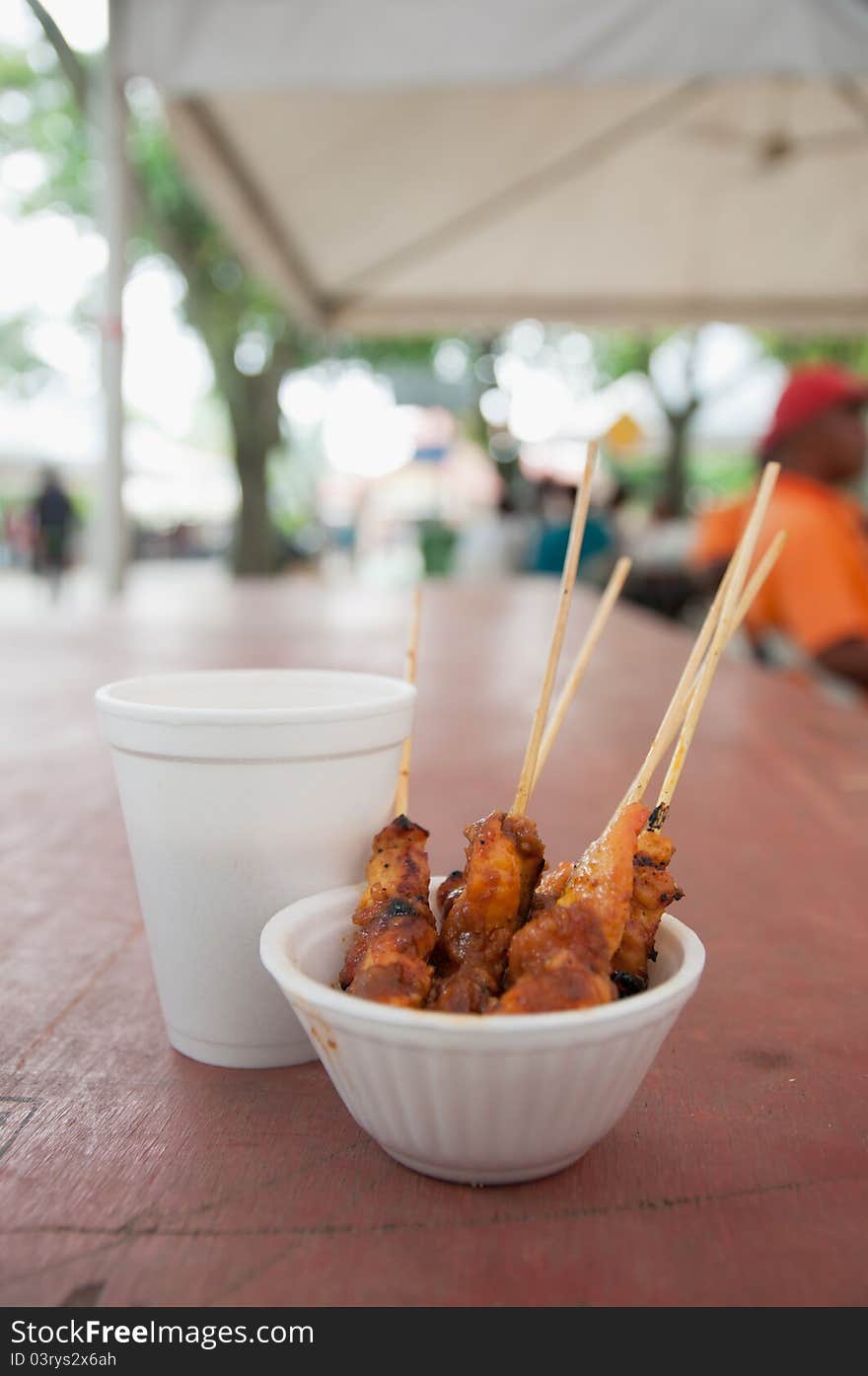 Grilled chicken satay with peanut gravy, one of malaysia's tradional food. Grilled chicken satay with peanut gravy, one of malaysia's tradional food