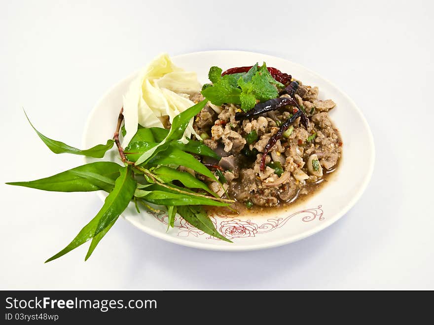 Ground duck salad is Thai food, with ground duck and rice, lime, chili and herbs.