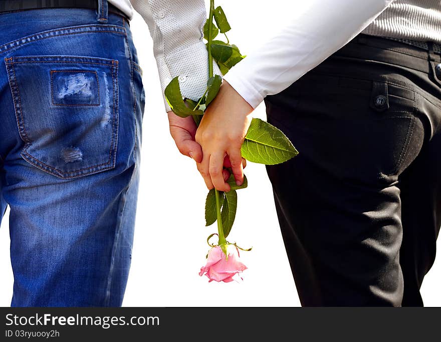 Loving couple with a rose in a hand