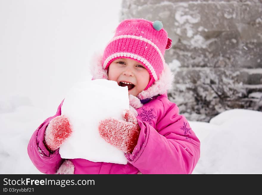 Girl Biting Piece Of Snow