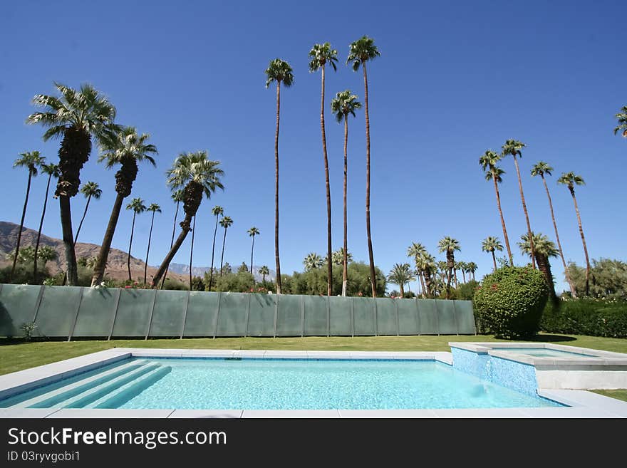 Pool with fence in Palm Springs, California. Pool with fence in Palm Springs, California.